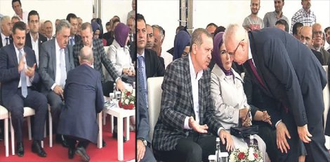 Başbakan'ın önünde çömelerek durdu