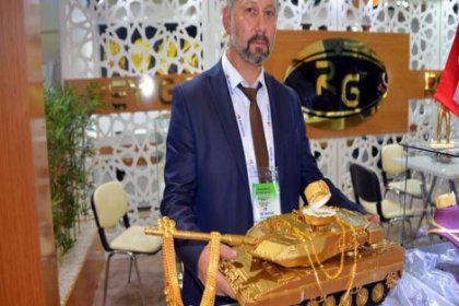 8 kilo altından tank yaptı