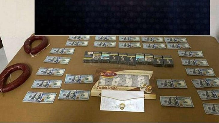 Rüşvet olarak 2 kangal sucuk, bir kutu lokum, 10 paket sigara ve 2 bin 500 dolar isteyen memur suç üstü yakalandı