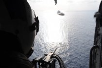 ABD, İran’a ait bir kargo gemisine ateş açarak işgal etti